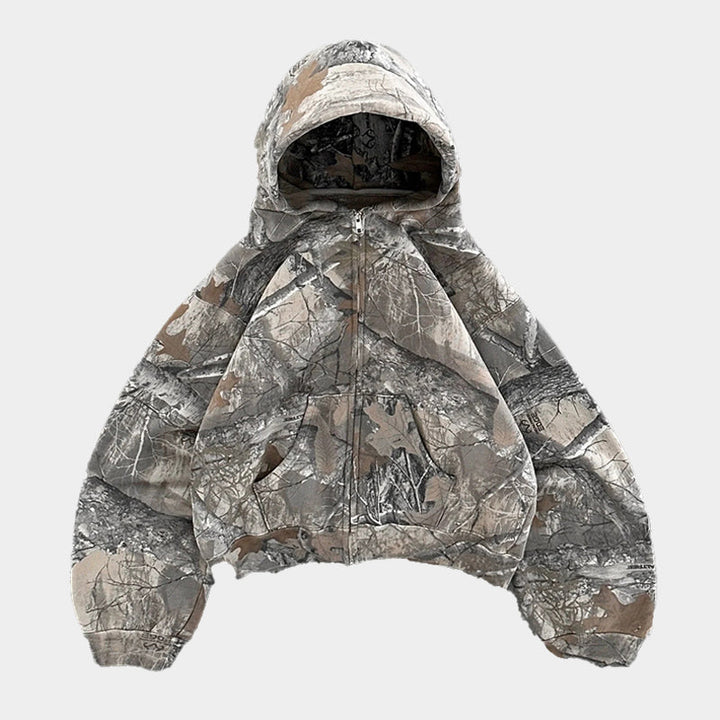 Trendy pánská mikina s kapucí v moderním maskáčovém provedení.