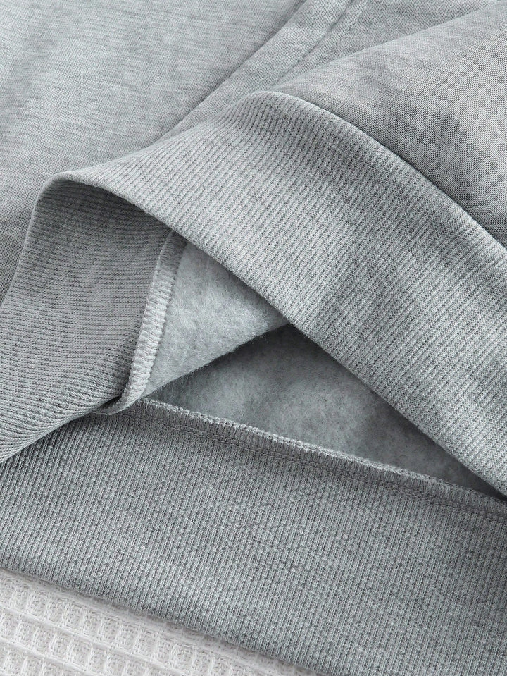 Stylová minimalistická mikina s kapucí a klokaní kapsou pro muže